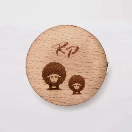 (Bild für) KnitPro Maßband - Holz - rund
